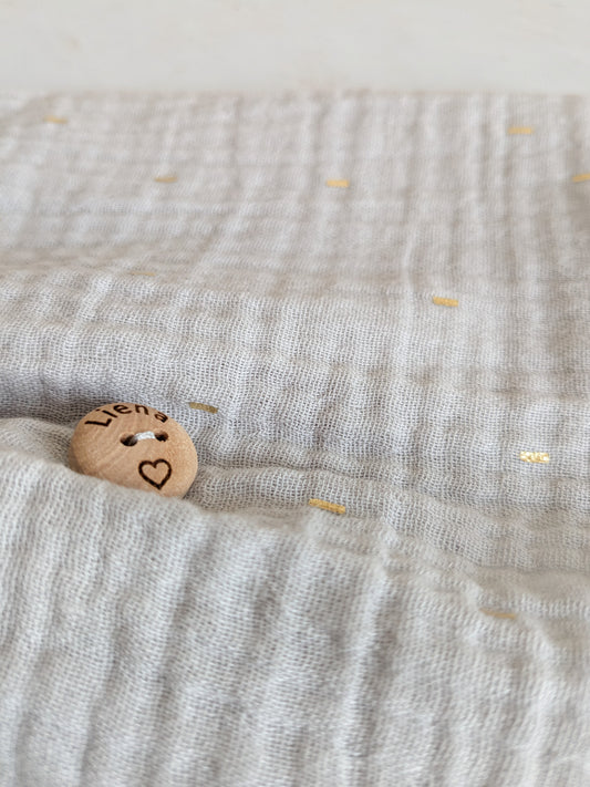 Grijs kleedje met gouden detail