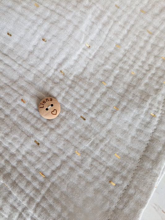 Grijs kleedje met gouden detail