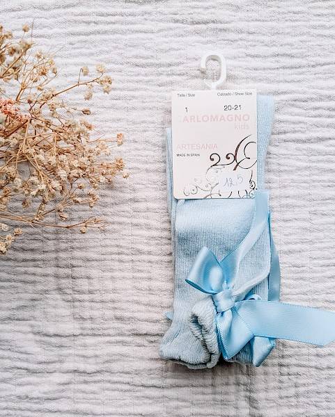 Kniekousen met strik - lichtblauw